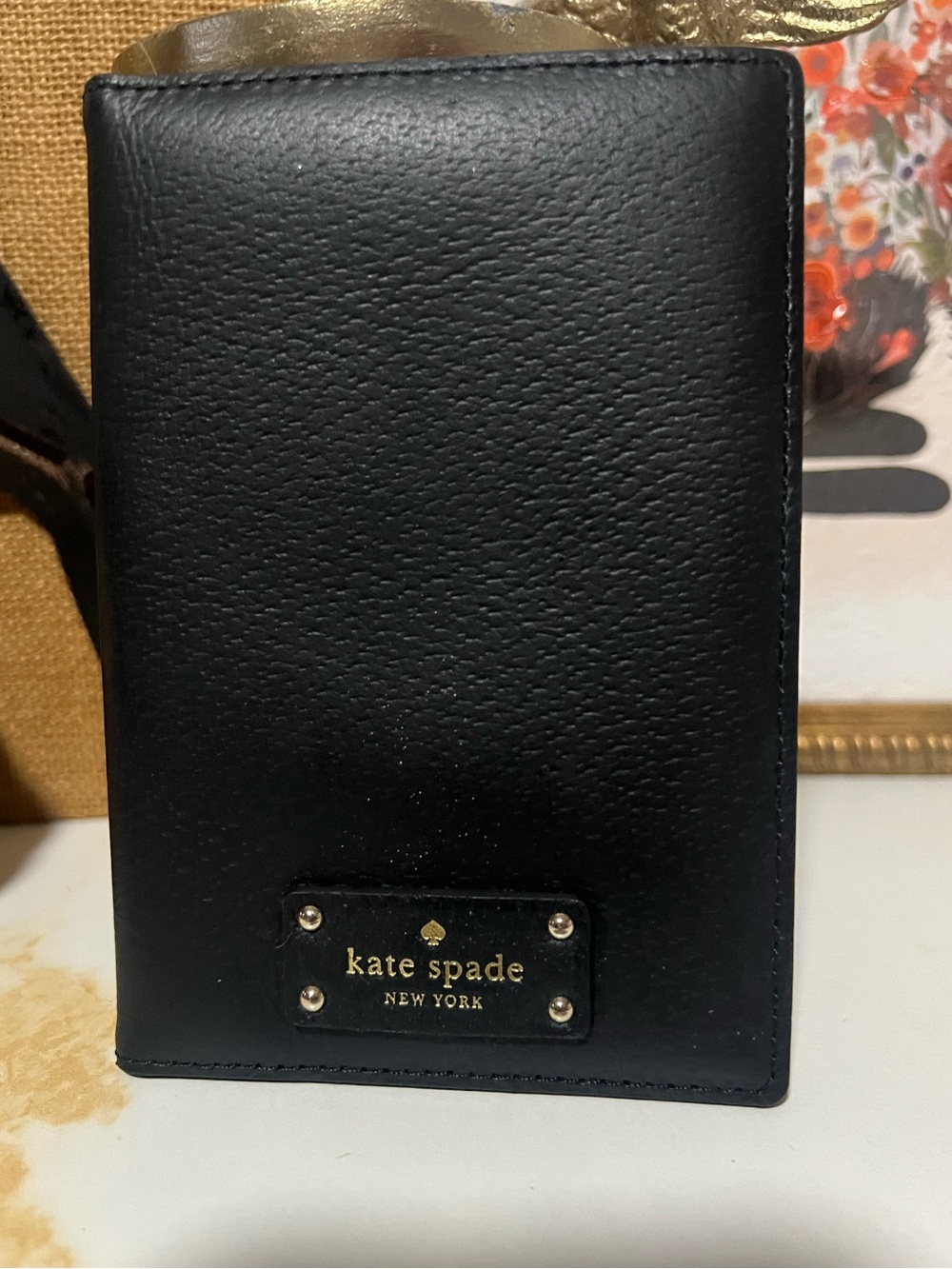 kate spade Black Leather Passport Wallet with Gold Logo Plate